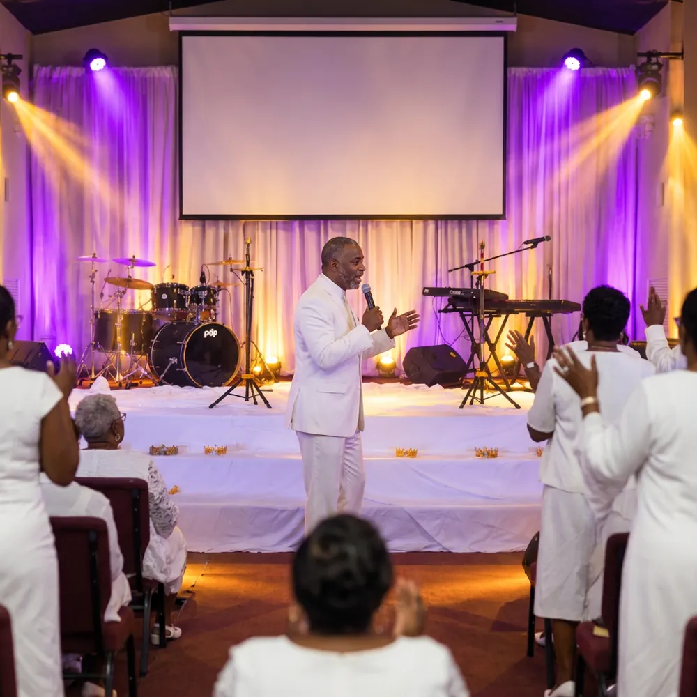 Worship service on a lit stage